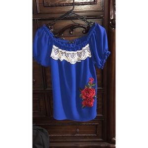 Blue shirt with roses
